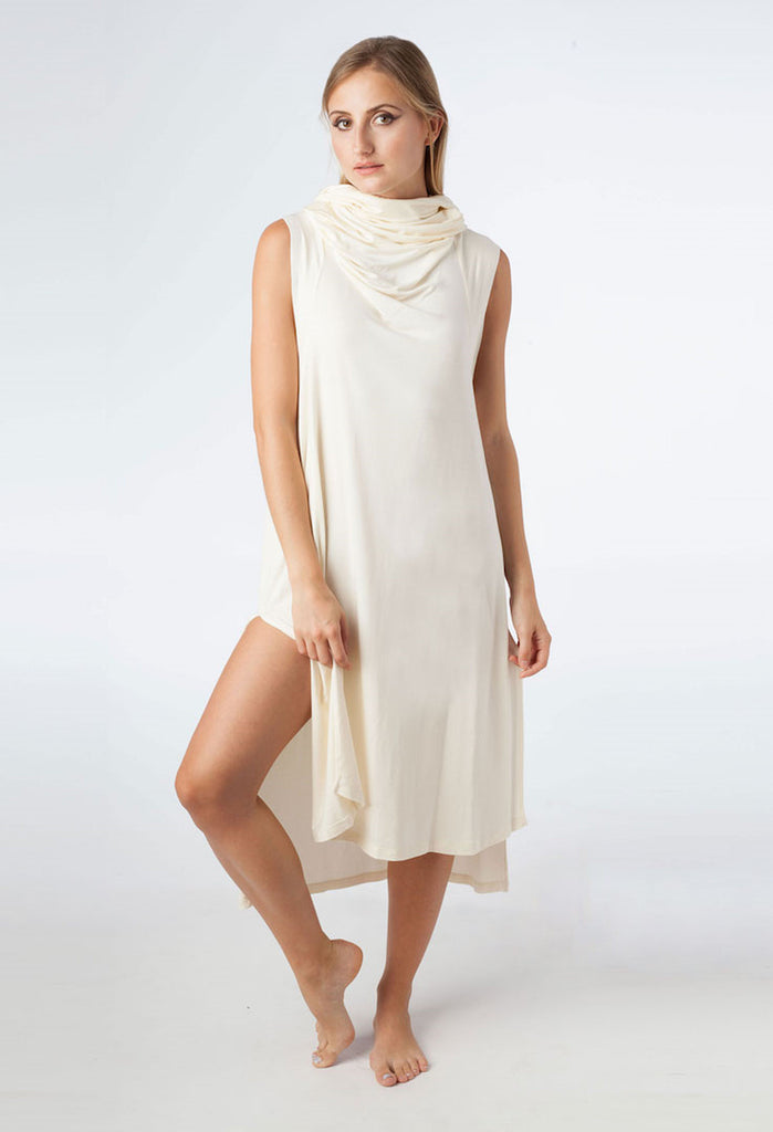 Woman wearing Ivory color Echape - a gender neutral long summer dress